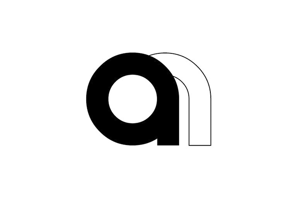 アンドドットネット株式会社のロゴ。黒色の太いゴシック体で小文字の「and.」と記されている