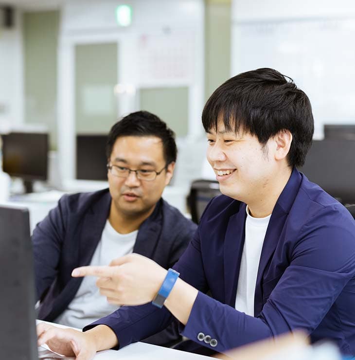 写真：田中さんと矢島さんの仕事の様子